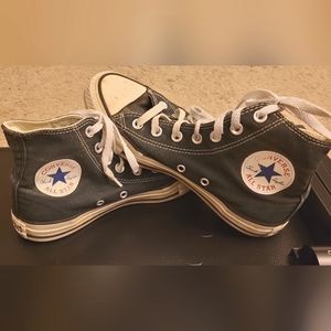 Chuck Taylor's black and white Converse high tops